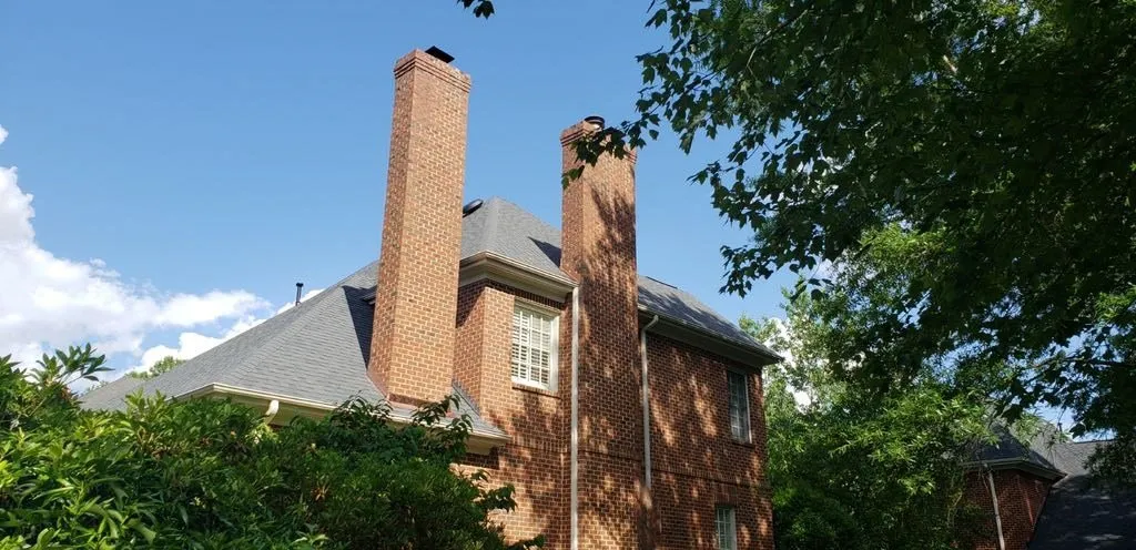 red brick house with dual chimney